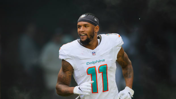 Miami Dolphins wide receiver Cedrick Wilson Jr. (11) enters the field to take on the New York Jets.